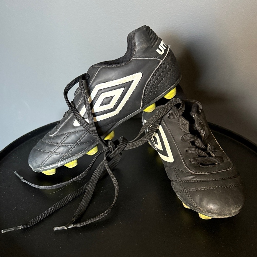 Umbro kids size 1 Black and White Cleats with Yellow Soles